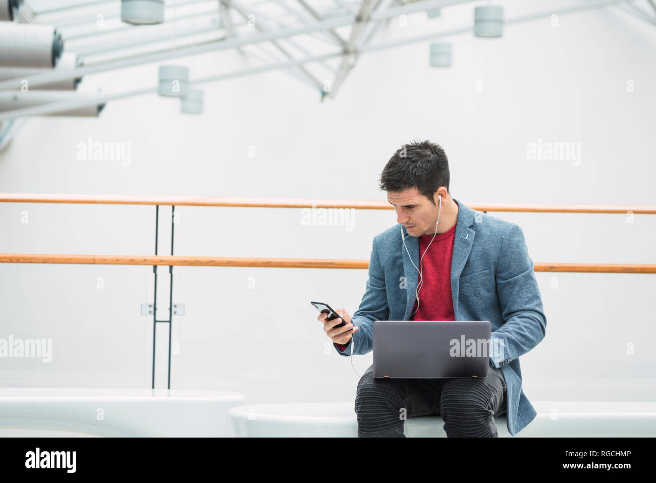 Man In Building Building three men sit hi-res stock photography and images - Alamy