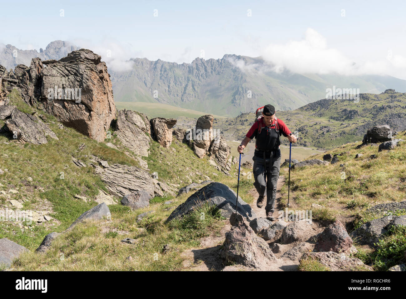 Russia, Caucasus, Mountaineer hiking in Upper Baksan Valley Stock Photo