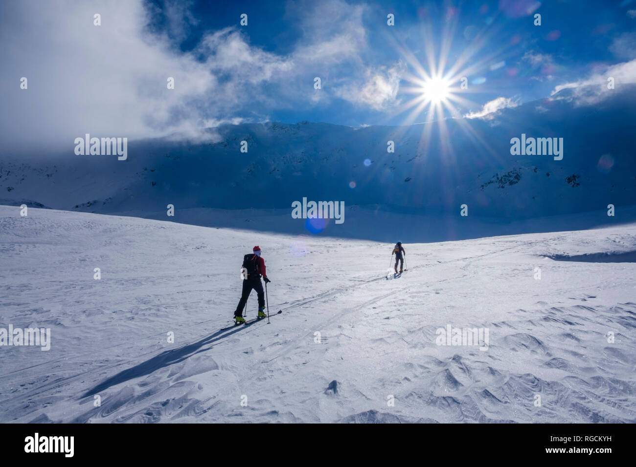 Two men doing a ski tour in Faragas mountains, Southern Carpathians, Romania Stock Photo