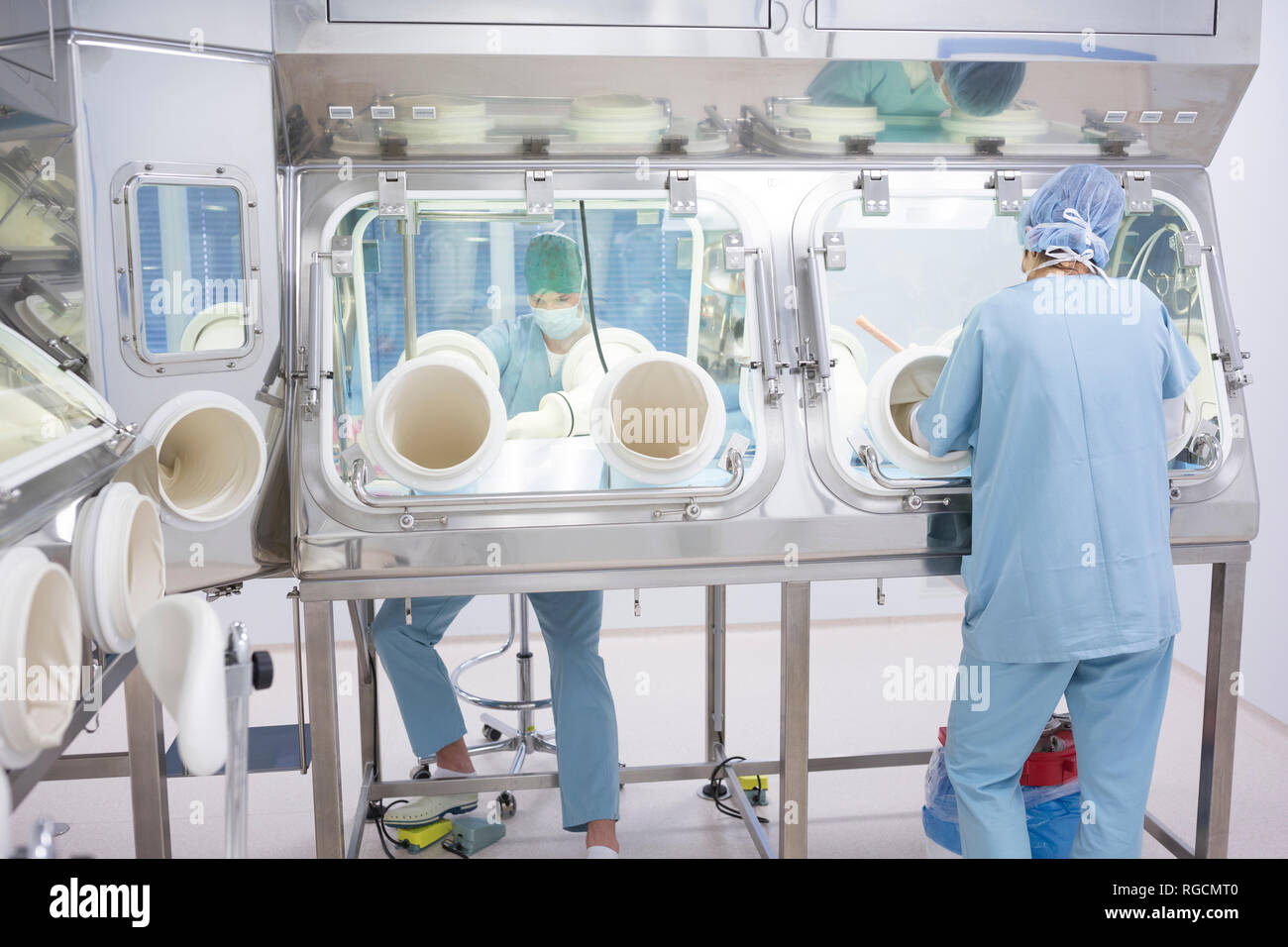Insulator Lab Scientists working in insulator laboratory Stock Photo - Alamy