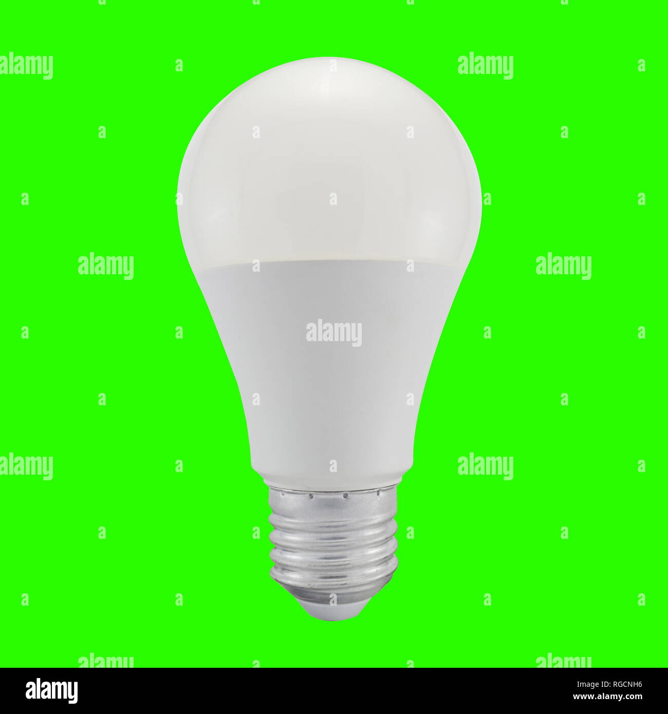 LED light bulb isolated on green background. Stock Photo