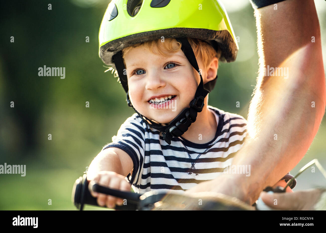 Wearing cycle helmets wearing cycle helmet hires stock photography and