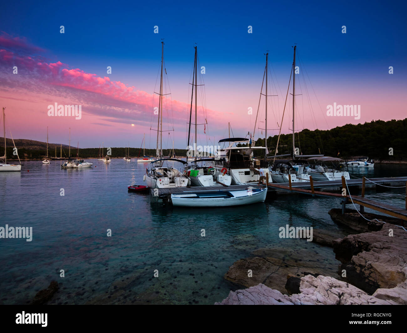 Croatia, Damlatia, Brac Island, marina at dusk Stock Photo