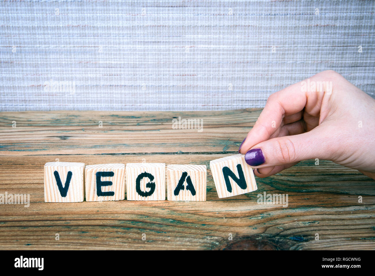 vegan. Wooden letters on the office desk Stock Photo Alamy