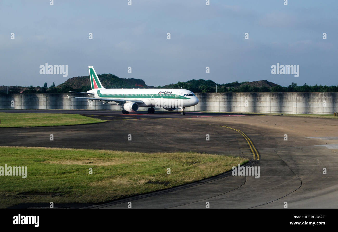 LONDON, UK - JUNE 12, 2018:  The AlItalia Airbus A321-100, named Domenico Colapietro, waiting to take off from London's Heathrow Airport on a sunny su Stock Photo