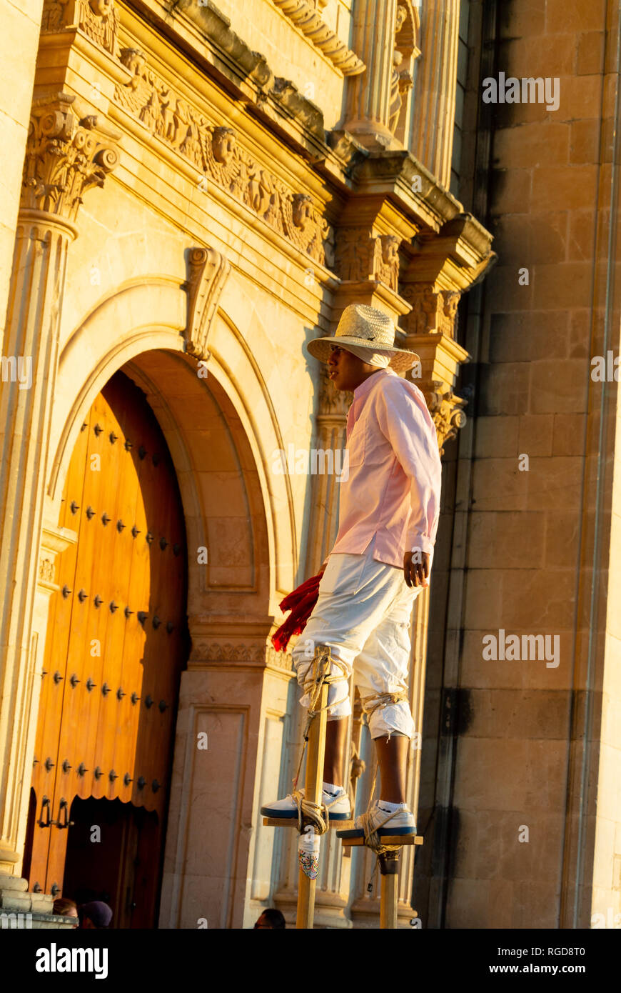 Local man walking on stilts, oaxaca, mexico Stock Photo