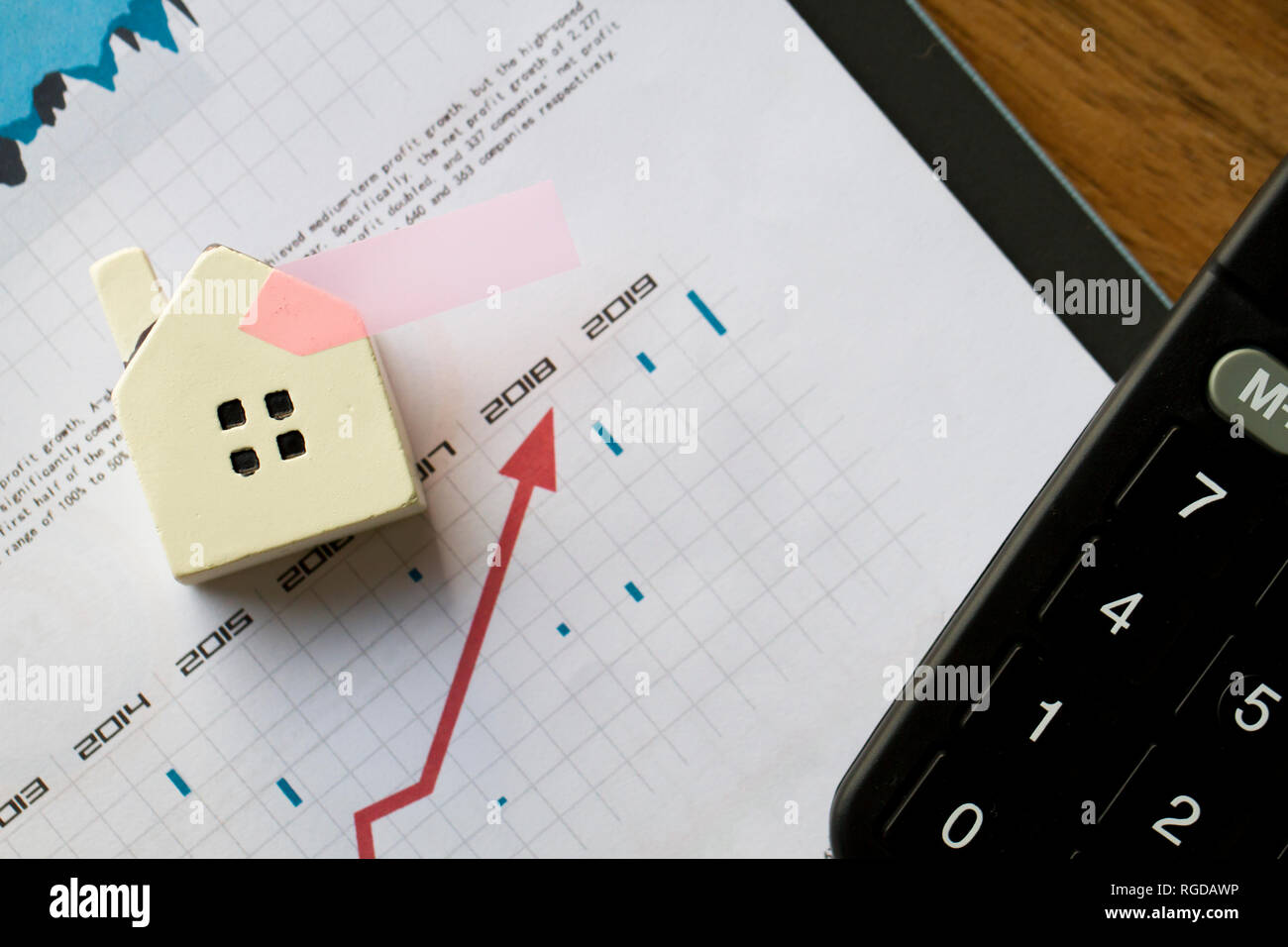 Small house and stock market chart K chart, career success Stock Photo