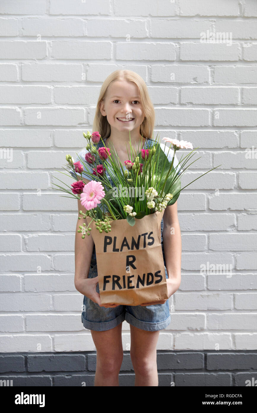 Portrait Smiling Girl Paper Bag Flowers Hi res Stock Photography And portrait-smiling-girl-paper-bag-flowers-hi-res-stock-photography-and
