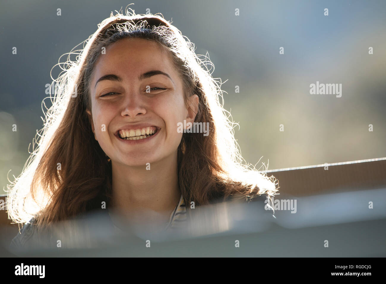 Portrait of smiling teenage girl Stock Photo