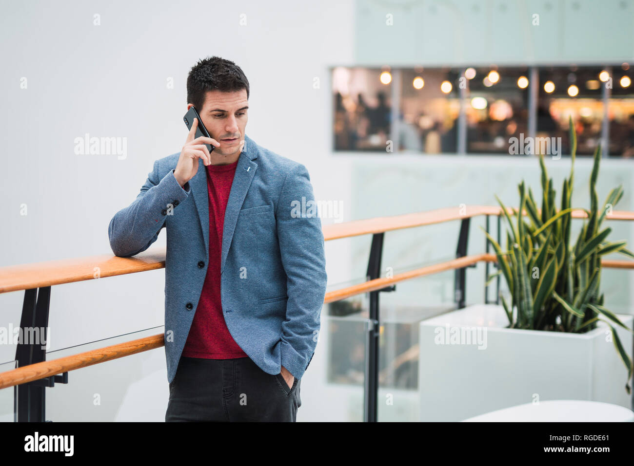 Man In Building Man in building lobby using hi-res stock photography and images - Alamy