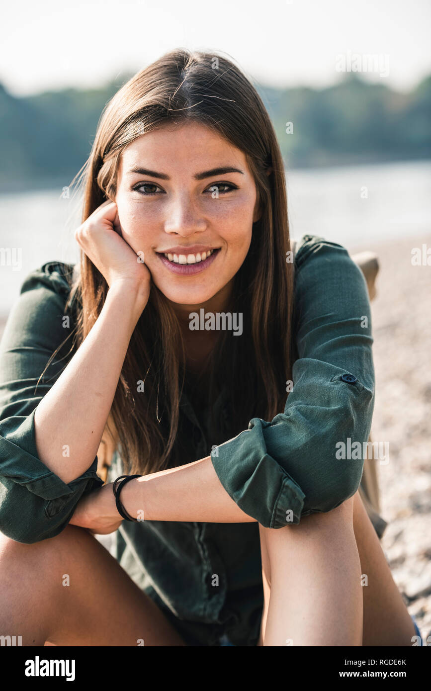 Woman relaxing sitting on big hi-res stock photography and images - Alamy