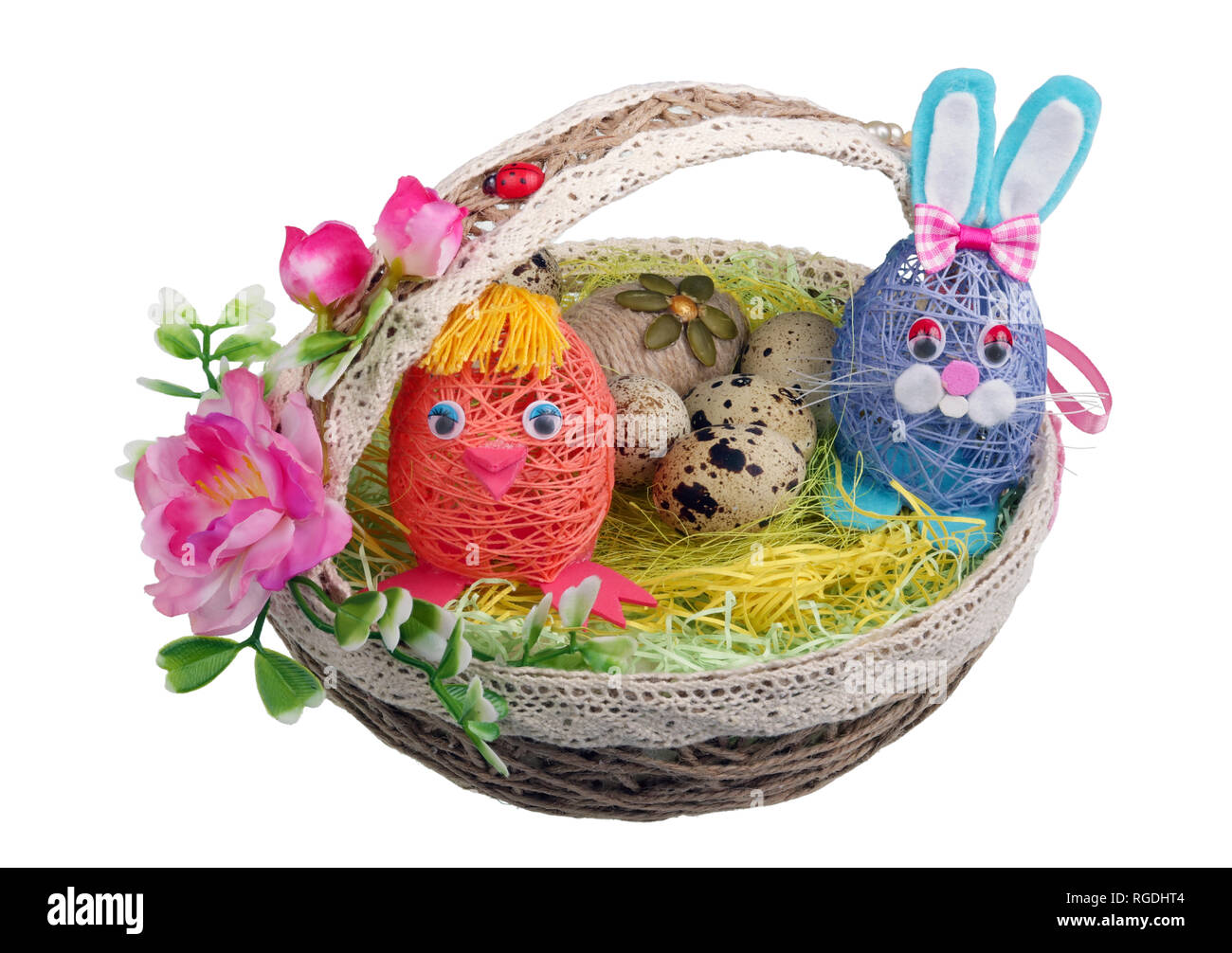 Easter handmade  nest from rope with funny chicken bunny  and eggs. Isolated on white studio macro shot Stock Photo