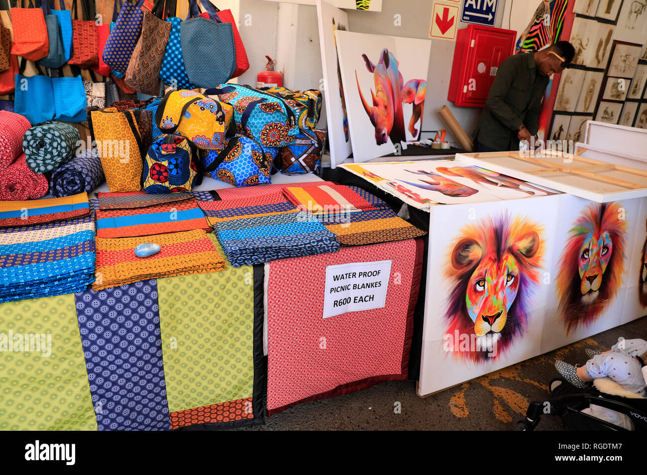 Blankets and artworks at the Bay Harbour market in Hout Bay, Cape Town