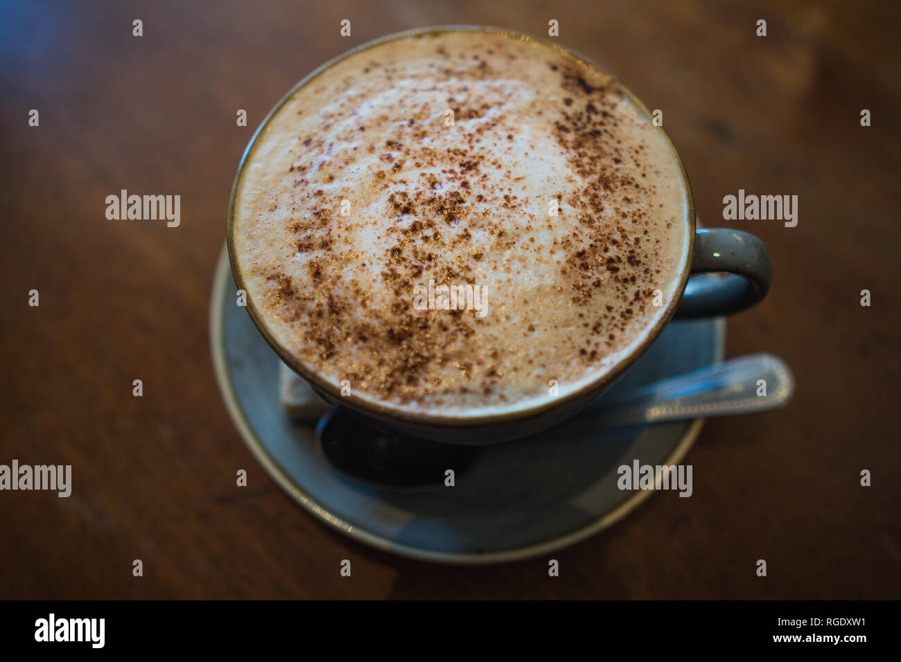 https://c8.alamy.com/comp/RGDXW1/delicious-cappuccino-with-chocolate-sprinkles-RGDXW1.jpg