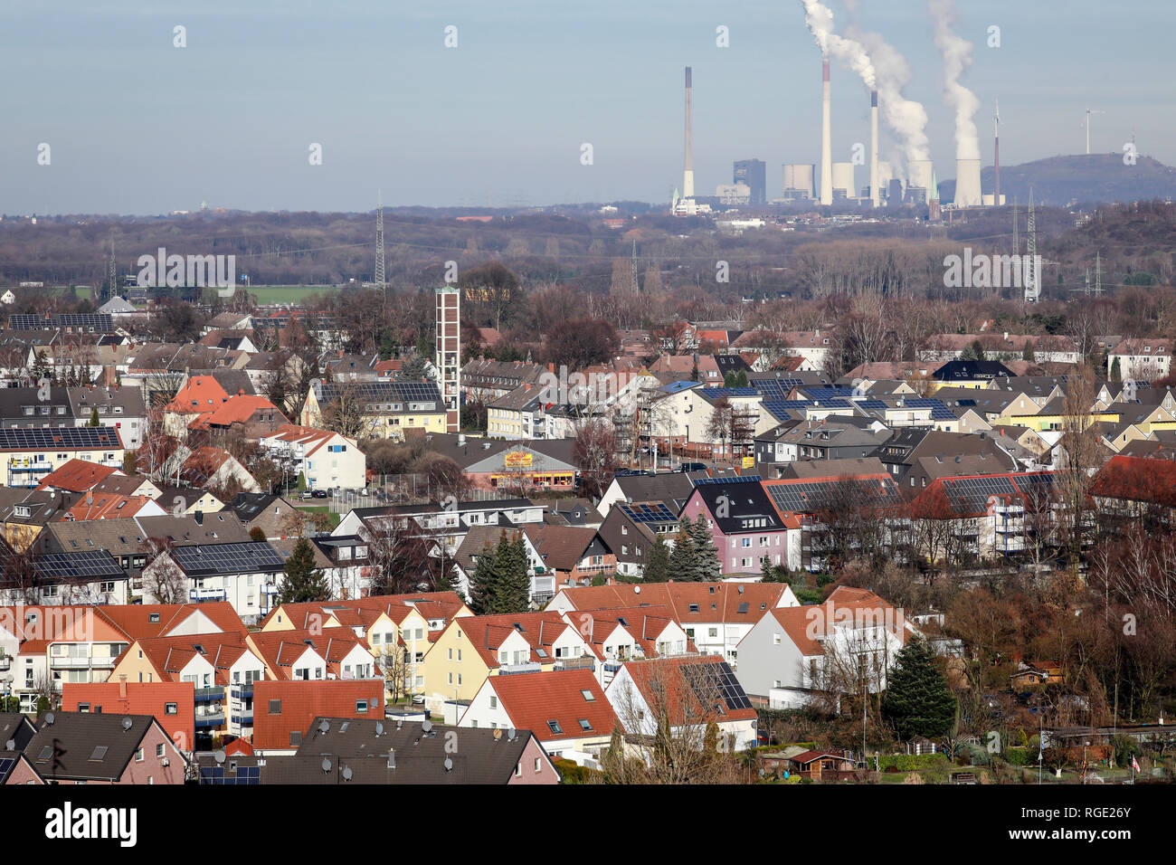 Bottrop, Ruhr area, North Rhine-Westphalia, Germany - Bottrop, housing estate with many solar roofs, behind the Scholven power plant, a power plant of Stock Photo