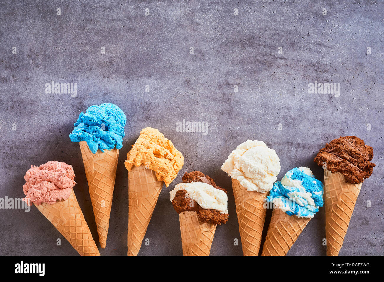 Border of assorted flavours of gourmet artisanal ice cream served in