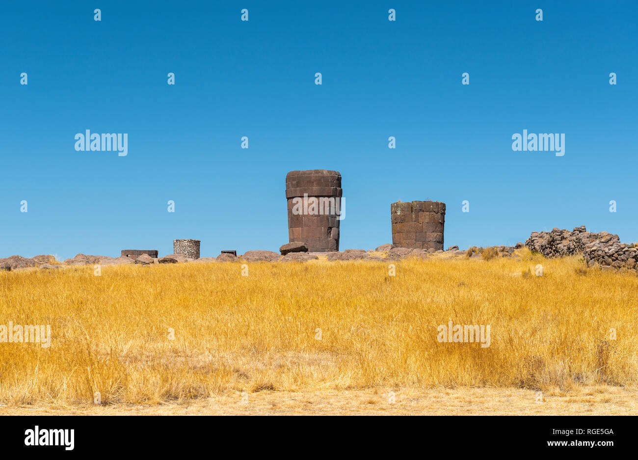 Landscape of Inca grave towers in Sillustani in the Titicaca Lake region nearby Puno city, Peru. Stock Photo