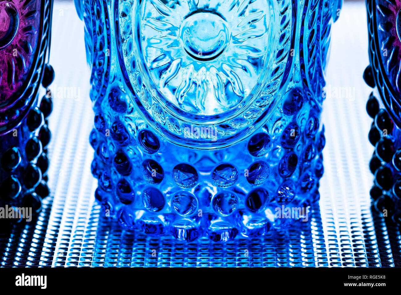 Coloured, patterned glass tumblers Stock Photo Alamy