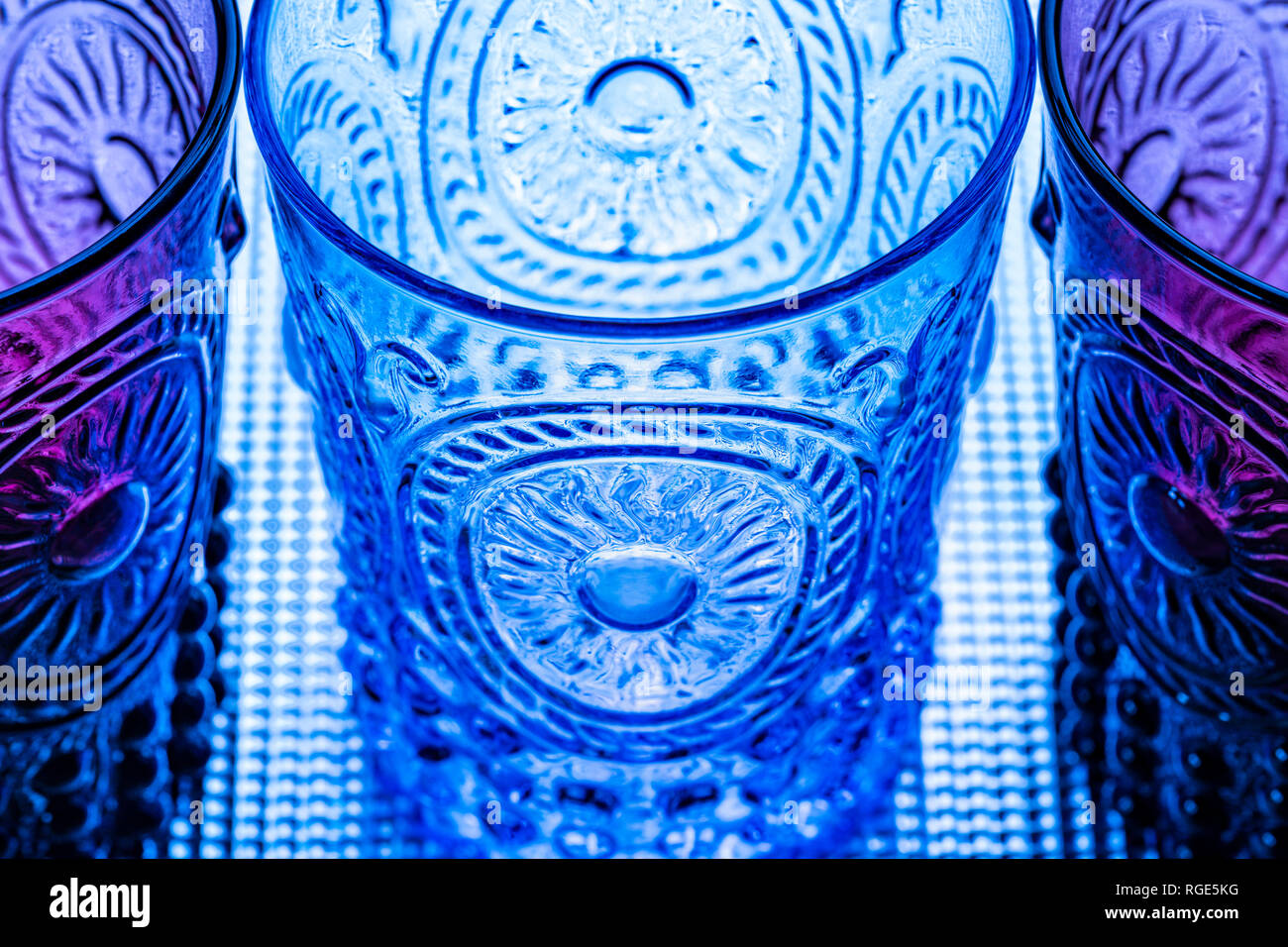 Coloured, patterned glass tumblers Stock Photo Alamy