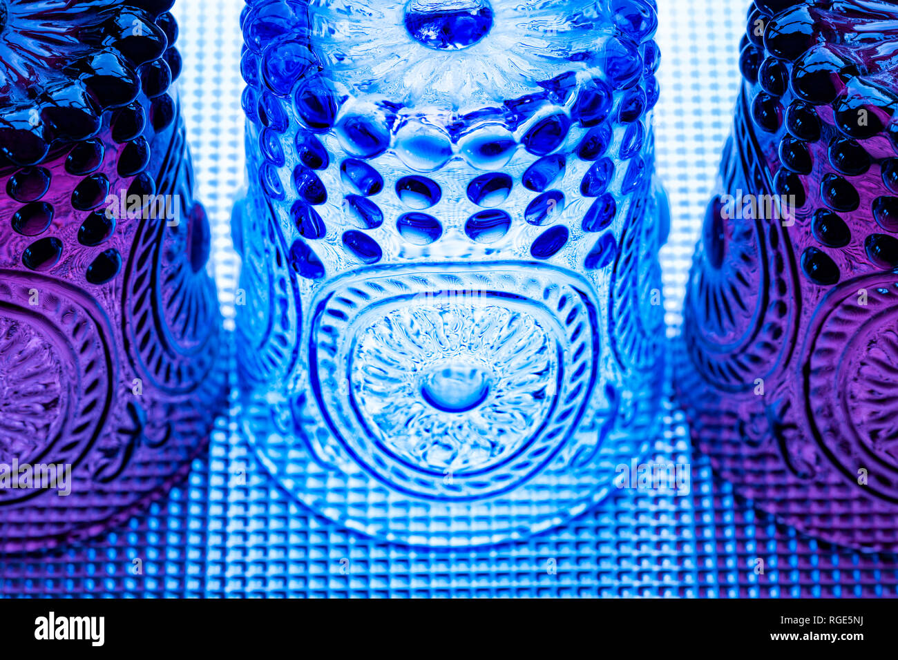 Coloured, patterned glass tumblers Stock Photo Alamy