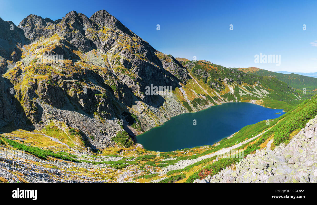 Panorama of Czarny Staw Gasienicowy and Maly Koscielec Peak surrounding from route to Skrajny Granat Peak, high Tatra mountains Stock Photo