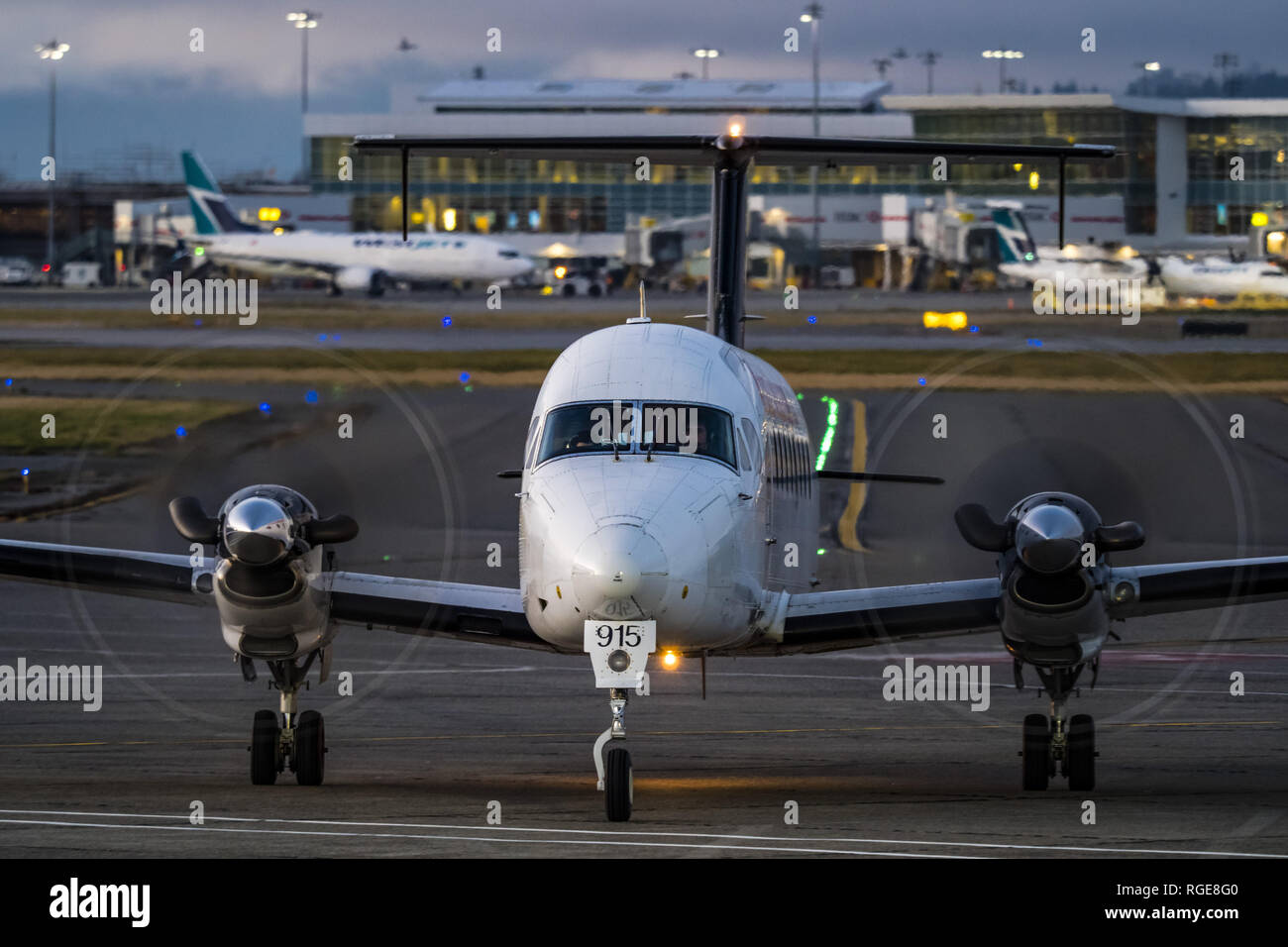 Richmond, British Columbia, Canada. 27th Jan, 2019. A Central Mountain Air Beech 1900D (C-FCME) turboprop regional airliner taxies to the South Terminal of Vancouver International Airport. Credit: Bayne Stanley/ZUMA Wire/Alamy Live News Stock Photo