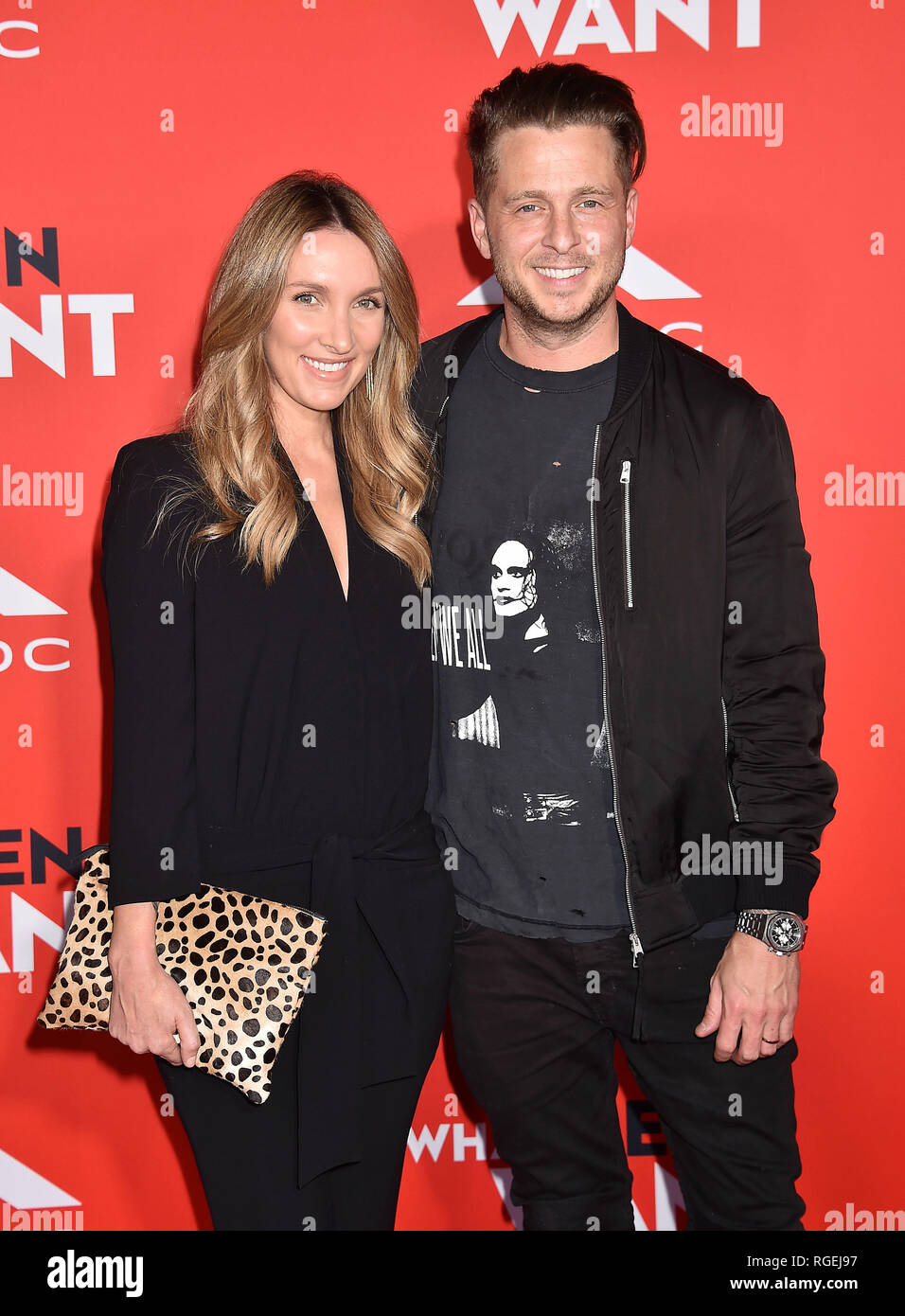 WESTWOOD, CA - JANUARY 28: Ryan Tedder, singer of OneRepublic (R) and and wife Genevieve Tedder arrive for Paramount Pictures' 'What Men Want' Premiere held at Regency Village Theatre on January 28, 2019 in Westwood, California.. Credit: Jeffrey Mayer/Alamy Live News Stock Photo