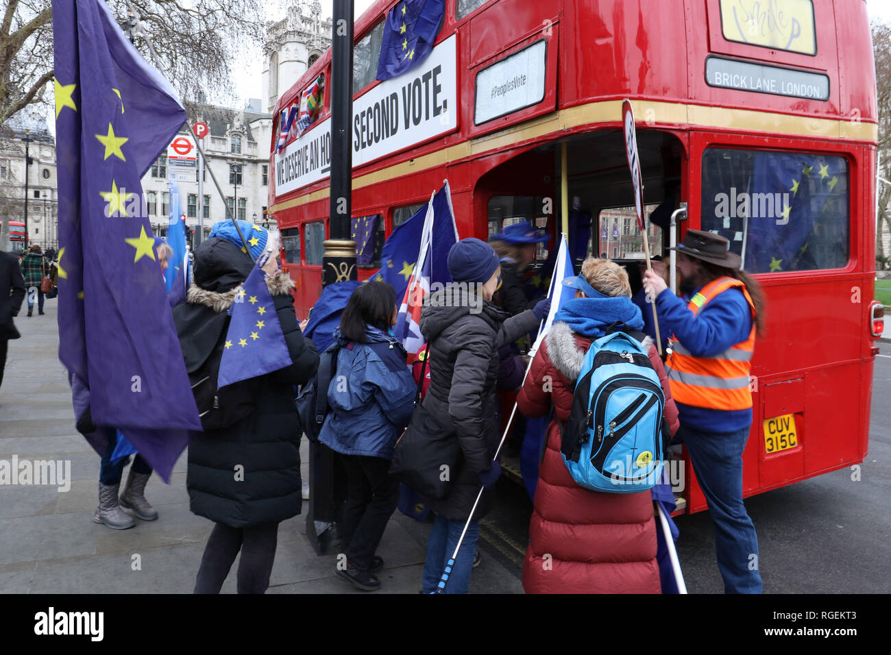 London, UK. 29th January, 2019. Stop Brexit supporters boarding the Stop Brexit Campaign Bus in front of Parliament, London, UK. Credit: Joe Kuis / Alamy Live News Stock Photo