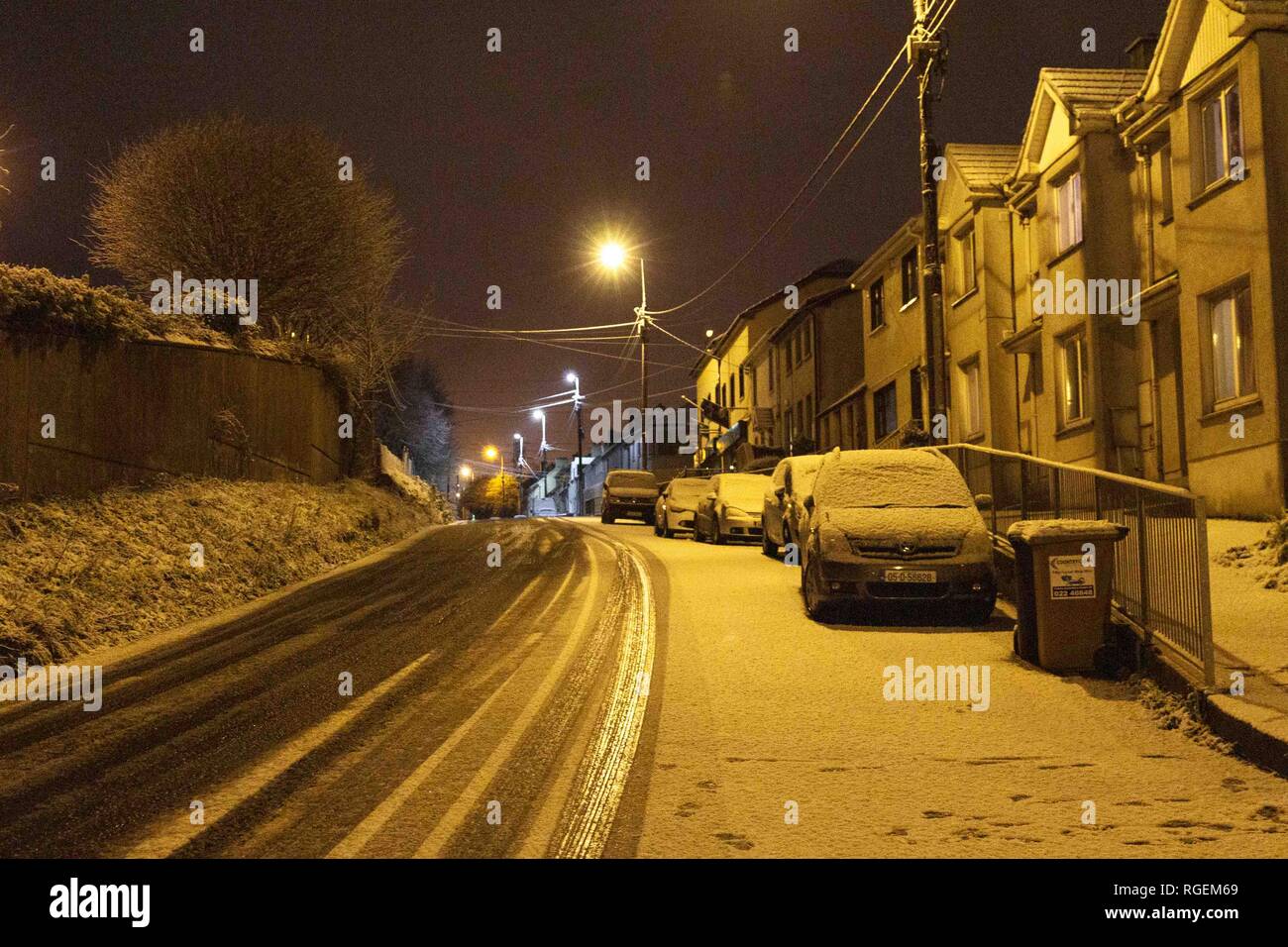Cork, Ireland, 29th January, 2019.   Snow in Ballyvolane, Cork City. Today a Yellow Weather Warning was put in place across the country by MET Eireann for ice and snow. Heavy snowfall hit parts of Cork City and County throughout the day making some roads treacherous and driving particularly dangerous throughout the city. Pictured here is the snow throughout the Ballyvolane/ Dublin Hill Area. Credit: Damian Coleman/Alamy Live News. Stock Photo