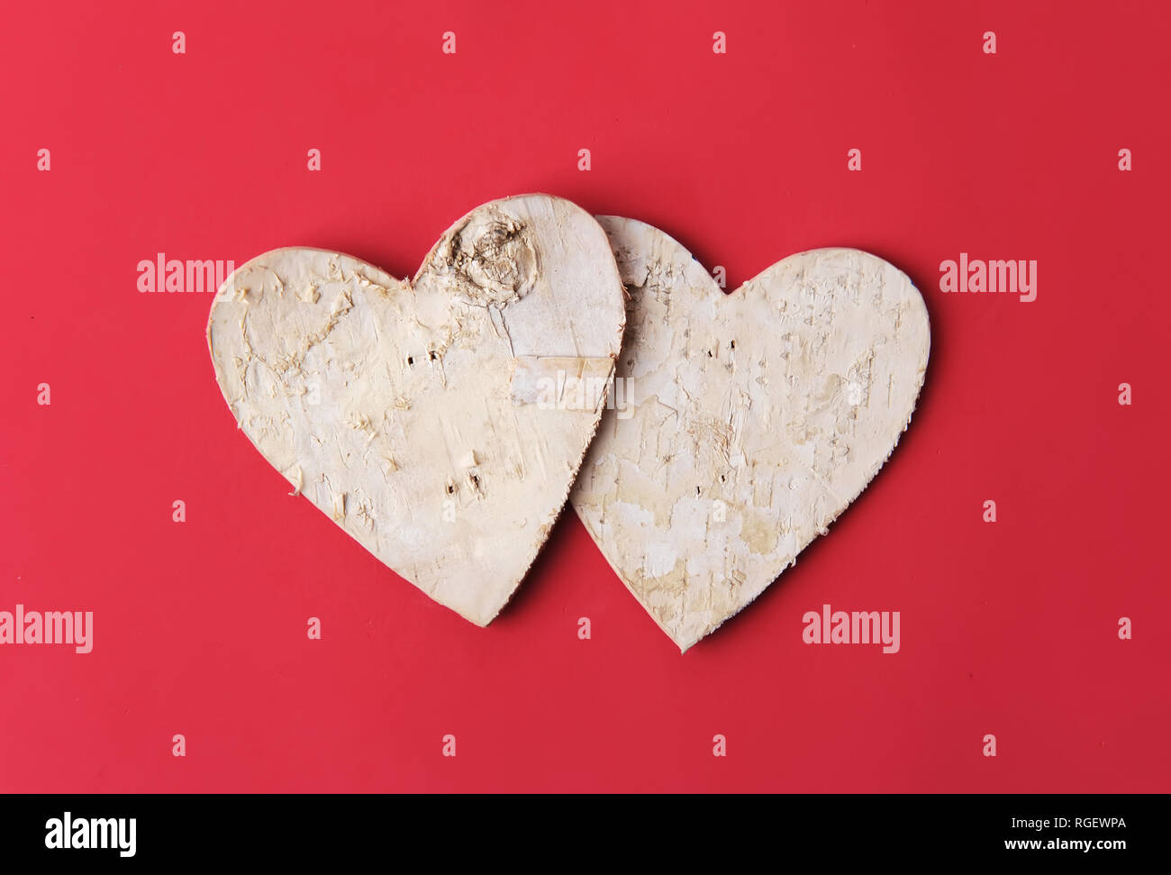 Love forever. Heart shape make of tree bark on red paper Stock Photo