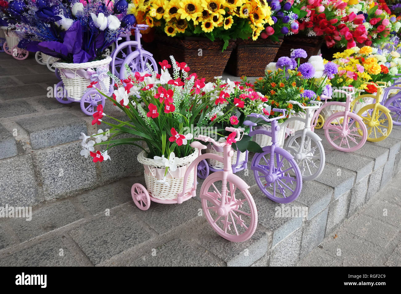 Bright yellow flowers in bicycle hi-res stock photography and images ...