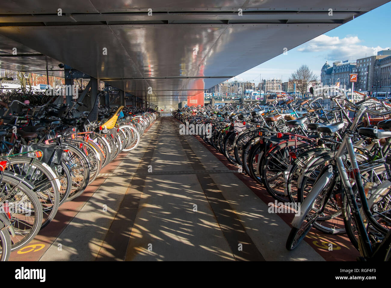 Hundreds of bicycles parked in a special parking garage for bikes near