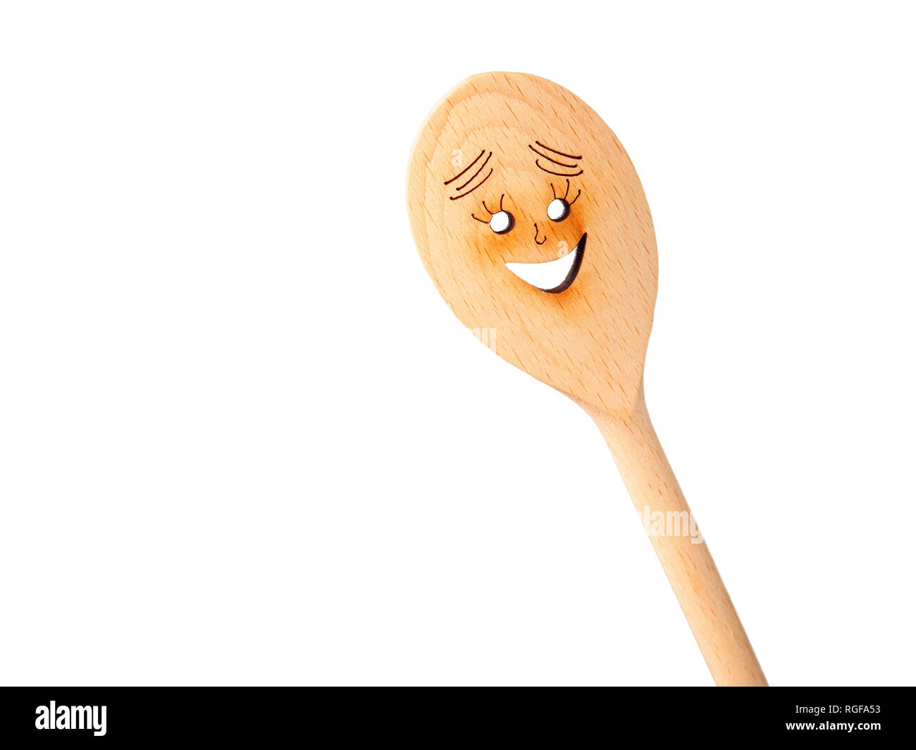 Tool. Wooden spool with an happy face painted on. Stock Photo