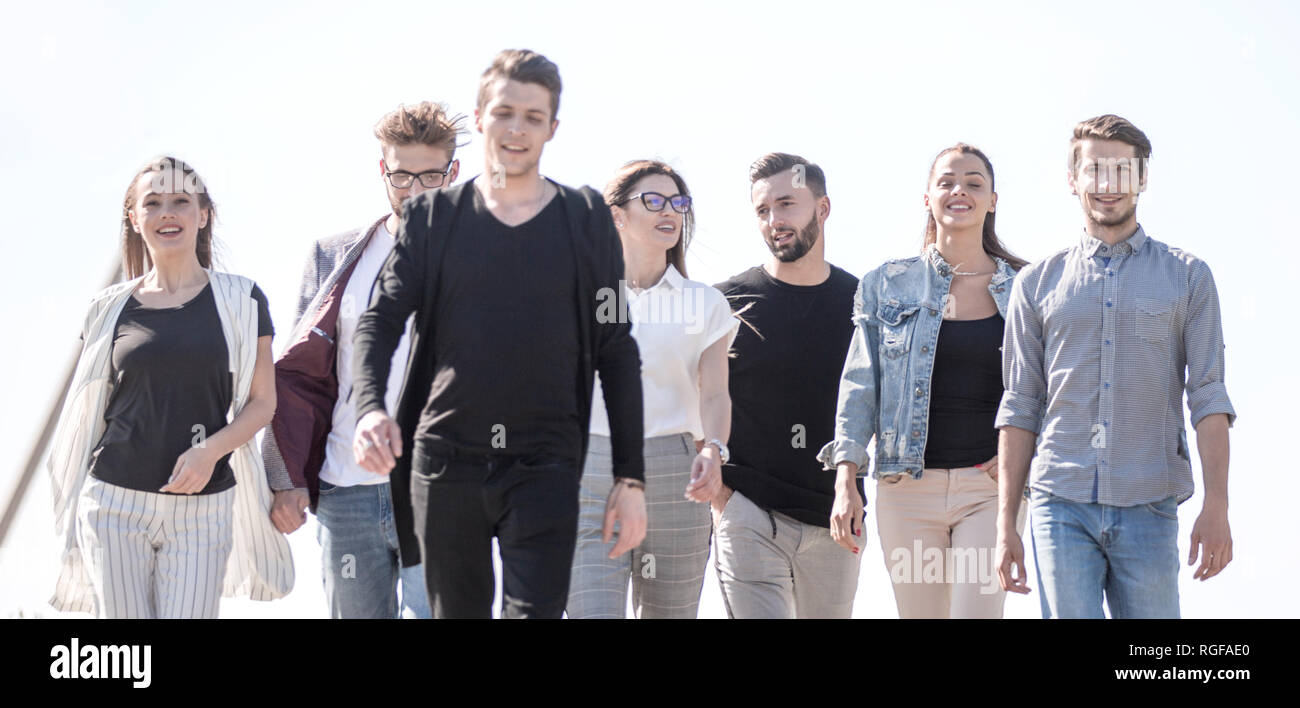 group of young people walking on the street Stock Photo - Alamy