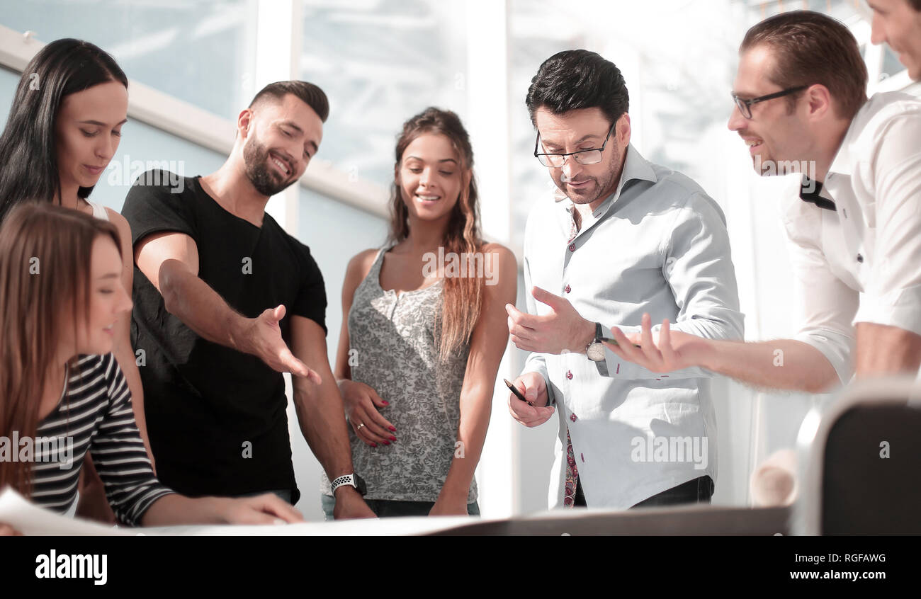 smiling team is working together on an architectural project Stock Photo