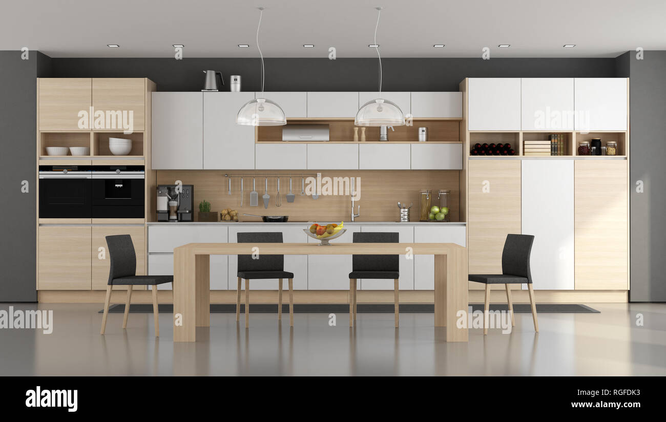 Wooden and white modern kitchen with dining table - 3d rendering Stock Photo
