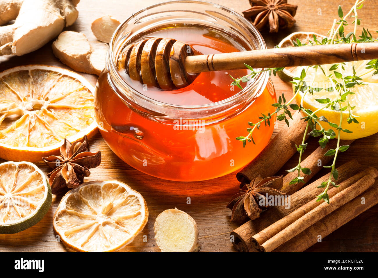 Honey with herbs and spices Stock Photo Alamy