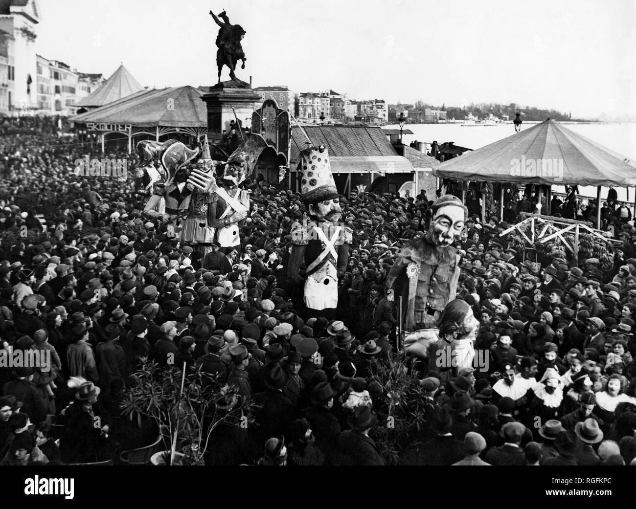 italy, veneto, carnival on the riva degli schiavoni in venice, 1930 Stock Photo