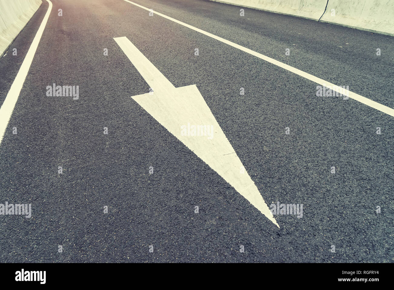 arrow sign on the road Stock Photo