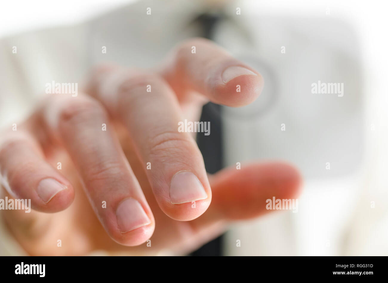Closeup of male hand touching empty virtual screen. Stock Photo