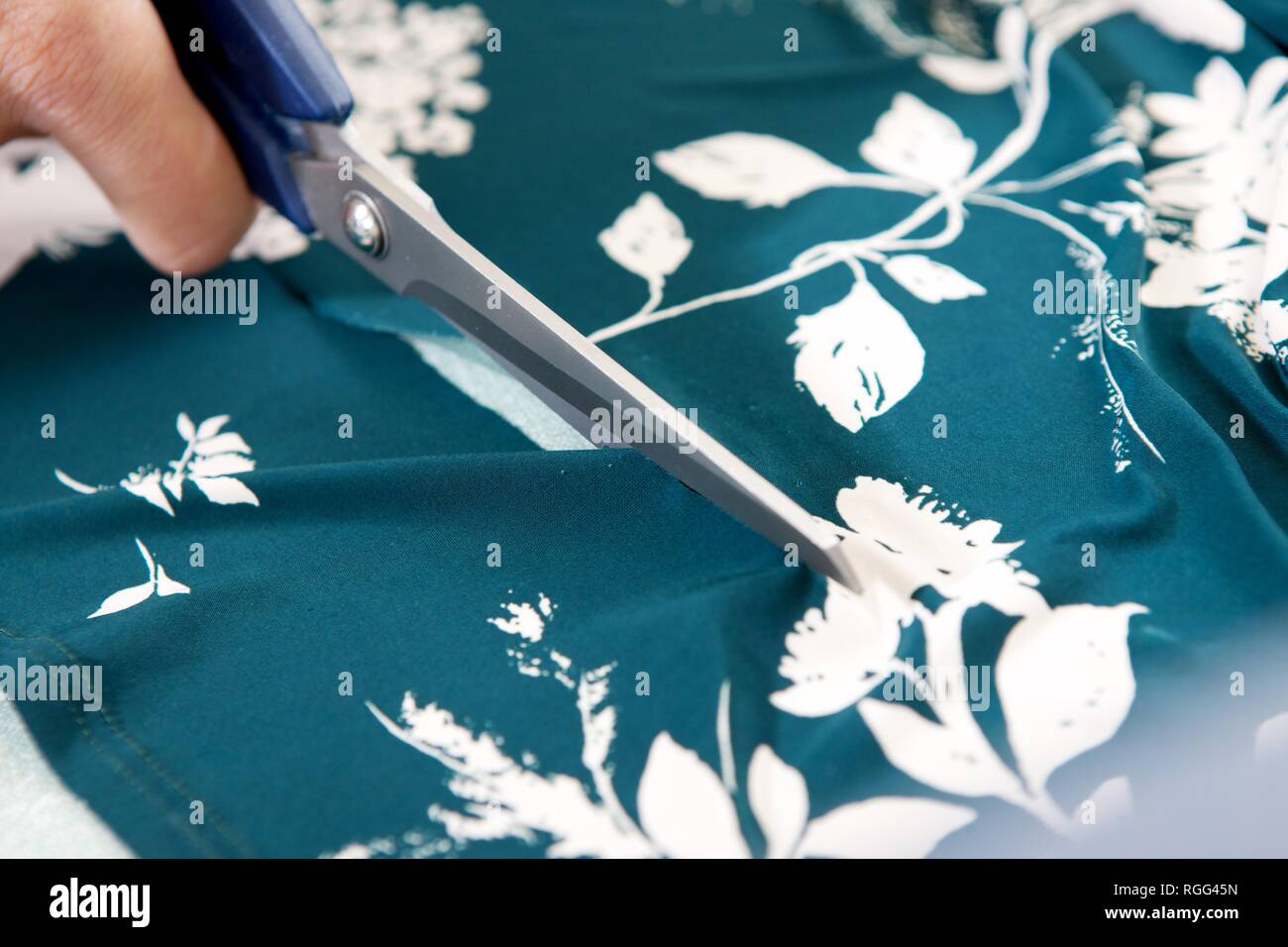 Sewing repair on clothing Stock Photo Alamy