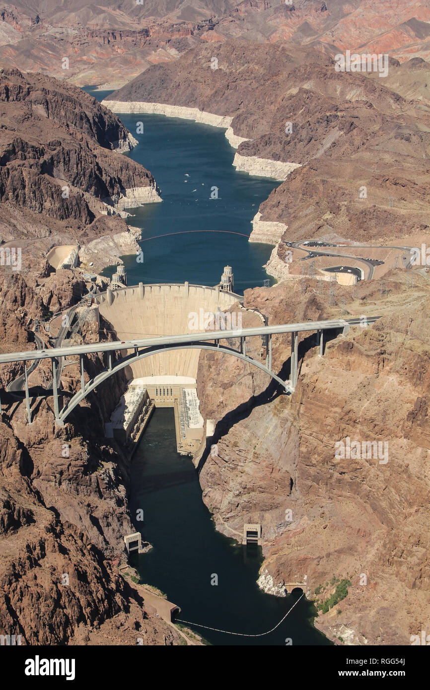 The Hoover Dam with the hydro electric powerplant retaining the Colorado river in Nevada seen from a helicopter Stock Photo