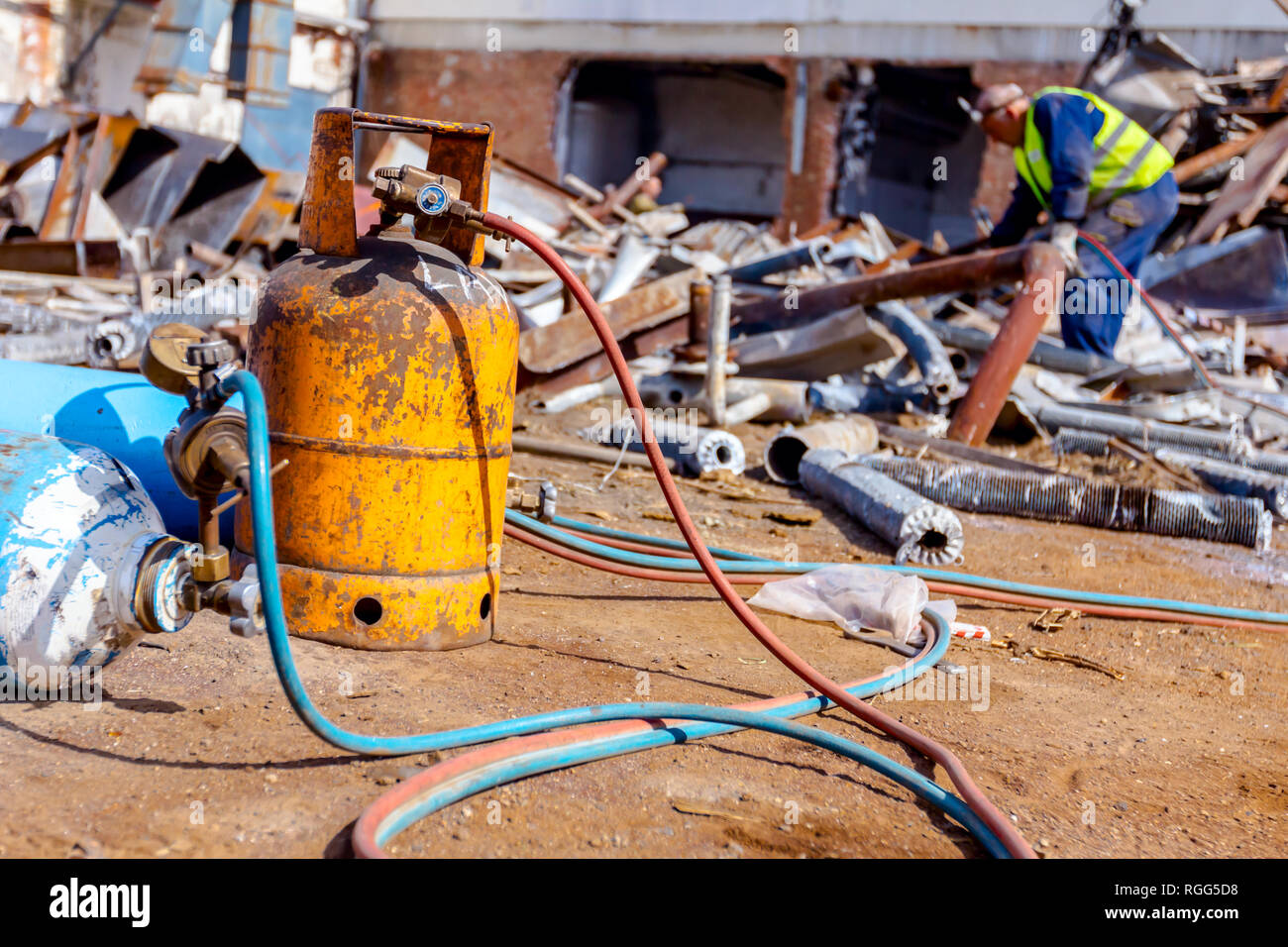 Oxygen and butane gas are in cylinder tanks with attached gauge