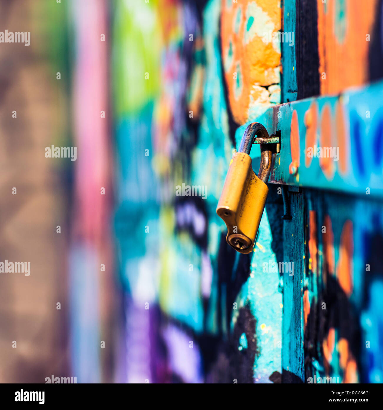 padlock on the graffiti door Stock Photo