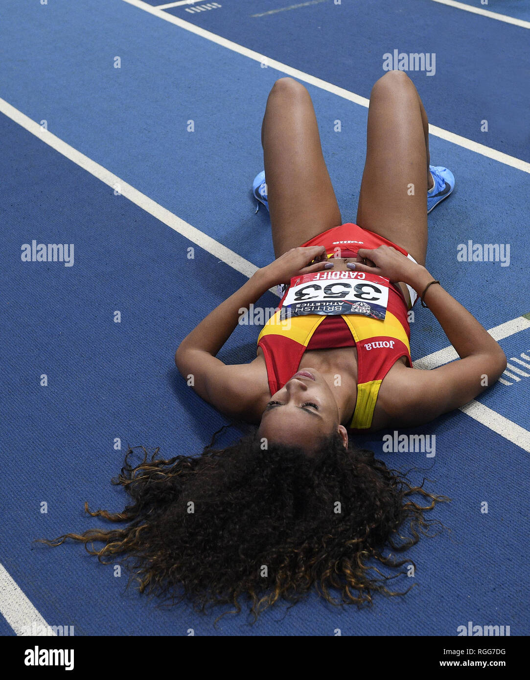 Spain Heptathlete Maria Vicente lay down after her jump during the Welsh Senior Athletics Championships / Combined events Indoor International 2019 at N.I.A.C in Cardiff. Stock Photo