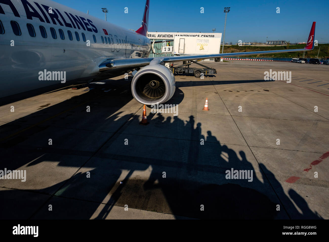 Shadows of passengers boarding a Turkish Airlines airplane Stock Photo