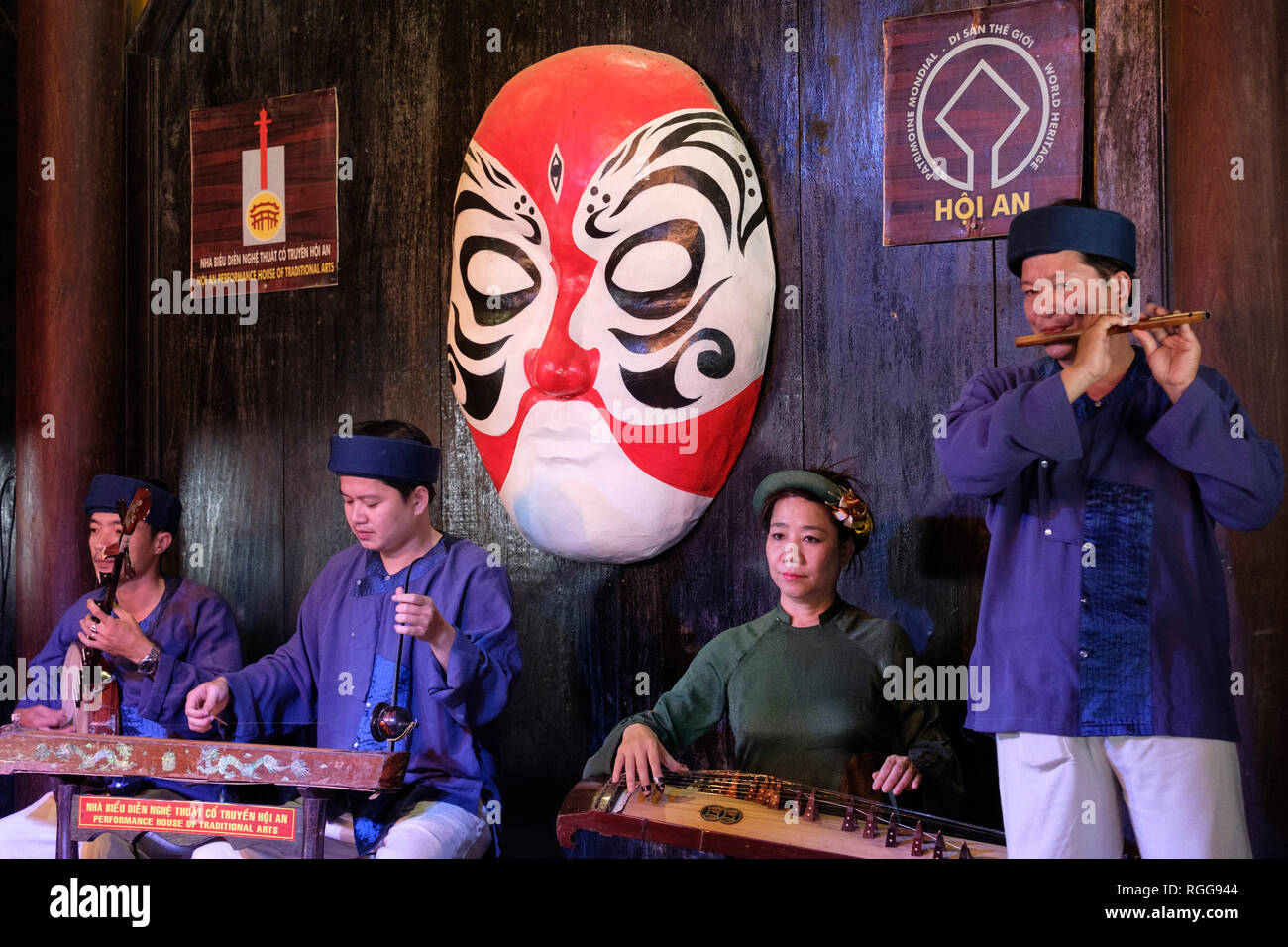 Musicians playing vietnamese music with traditional musical instruments in Hoi An, Vietnam Stock Photo