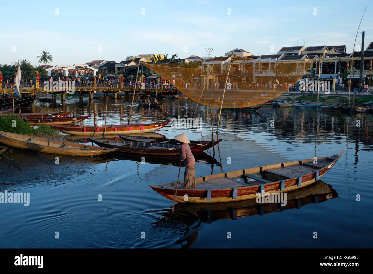 Boats and fishing net on the Thu Bon river in Hoi An, Vietnam Stock Photo