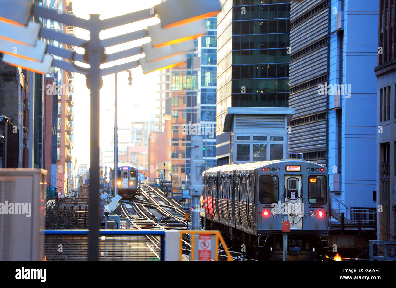 Chicago "L" trains running on elevated railroad tracks near State/Lake  station in the Loop of Chicago. Illinois.USA Stock Photo - Alamy