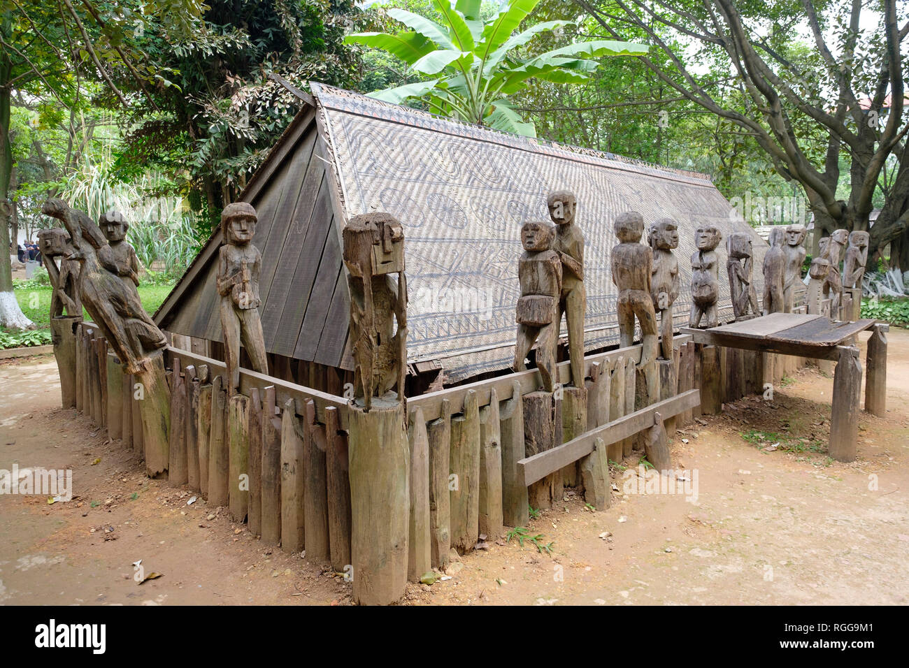 Giarai tomb with wooden statues at the Vietnam Museum of Ethnology, Hanoi, Vietnam, Asia Stock Photo